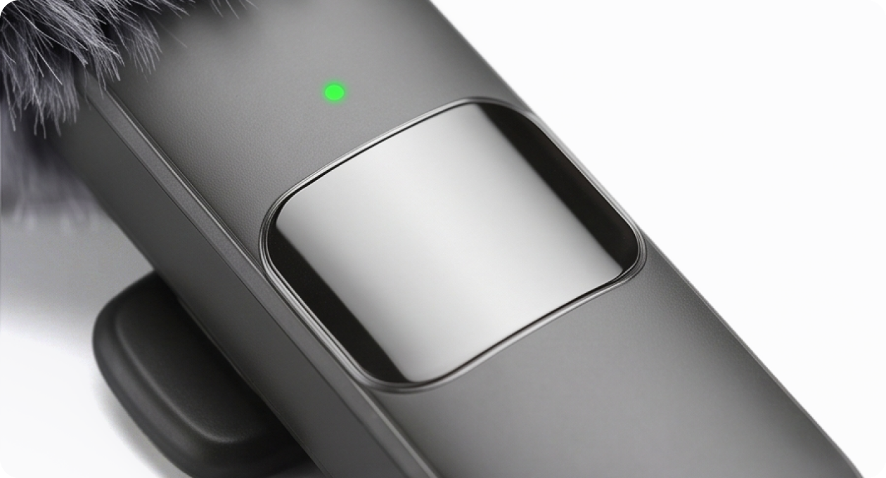 Front of the Mini Mic Pro showing the green recording light and mirror-finish panel